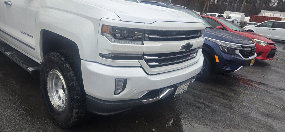 White Chevrolet Silverado, front view, repaired in Schenectady, NY