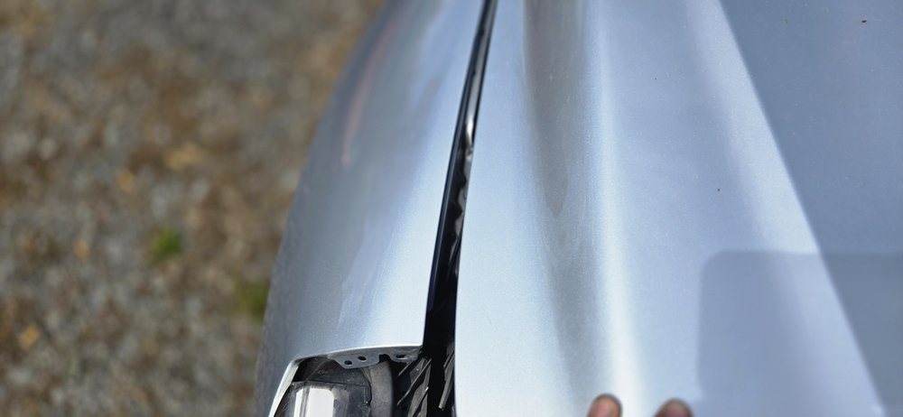 Creased fender before repair, repaired in Schenectady, NY